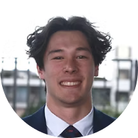 Man smiling in a suit